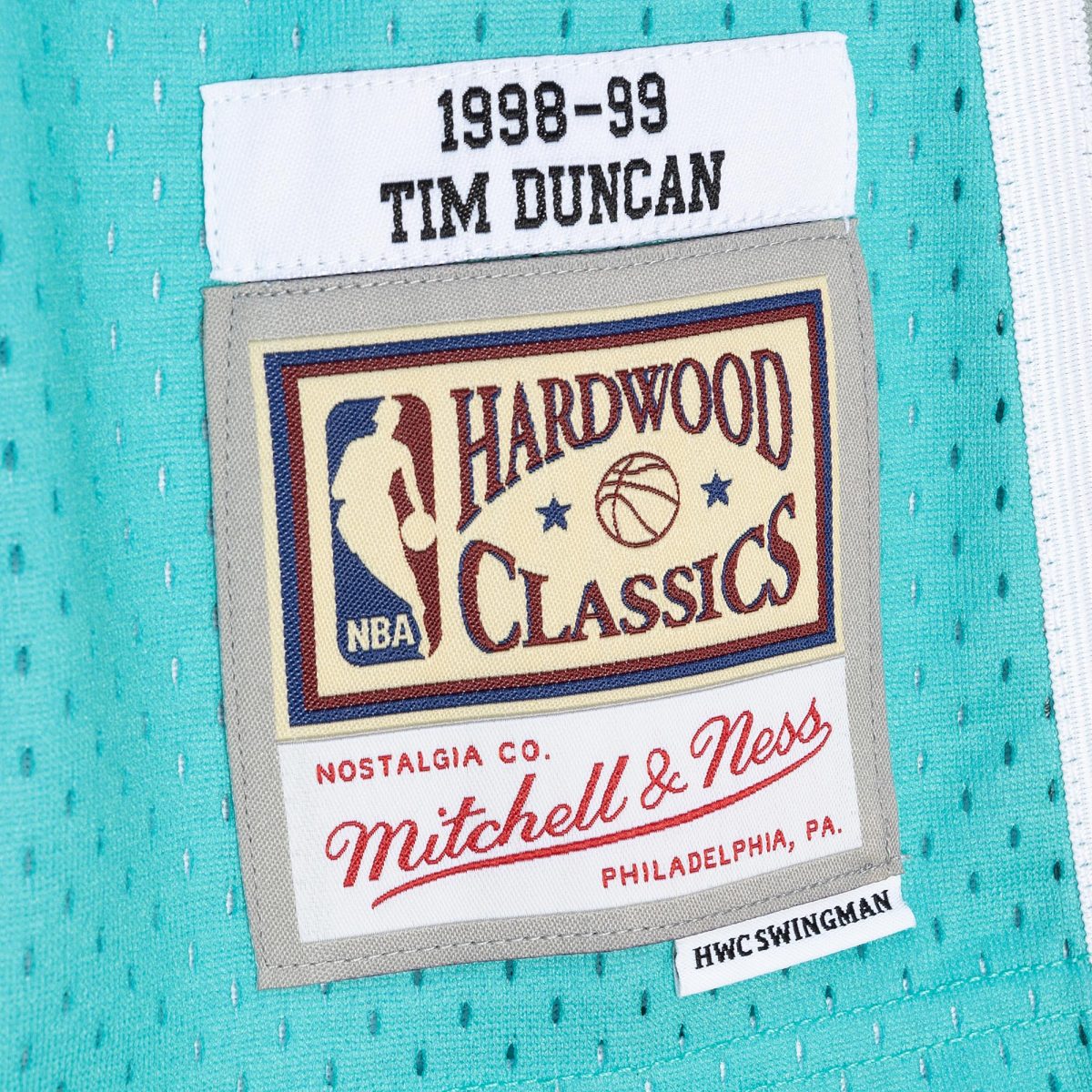 San Antonio Spurs mens san antonio spurs tim duncan mitchell  ness blackteal hardwood classics 199899 split swingman jersey Collection | Official Spurs Store